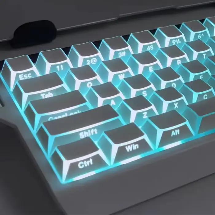 Clavier mécanique avec touches à bords incurvés et impression latérale