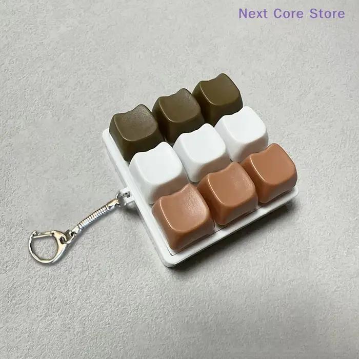 Antistress 9 touches clavier bouton doigt clé capuchon pendentif