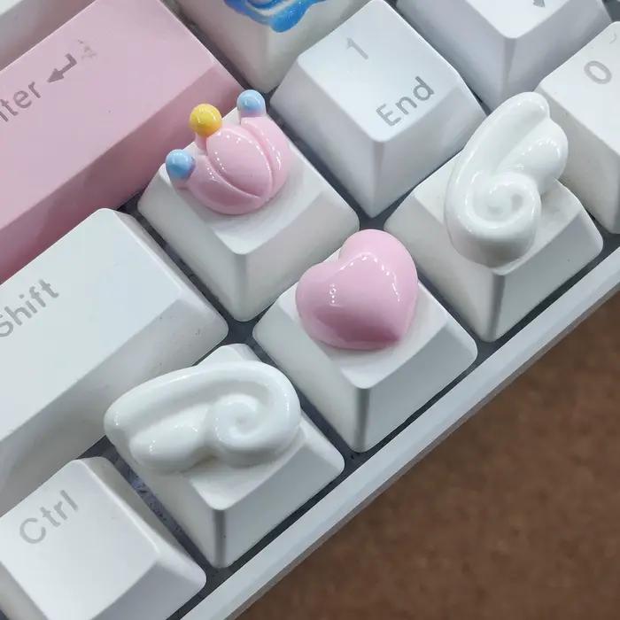 Capuchons de touches directionnels pour clavier mécanique