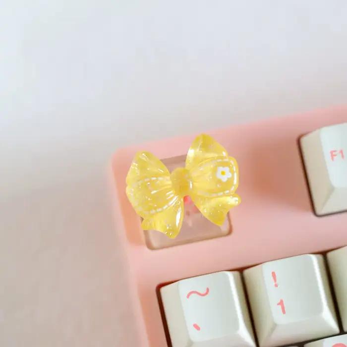 Capuchons de touches de clavier avec nœud translucide