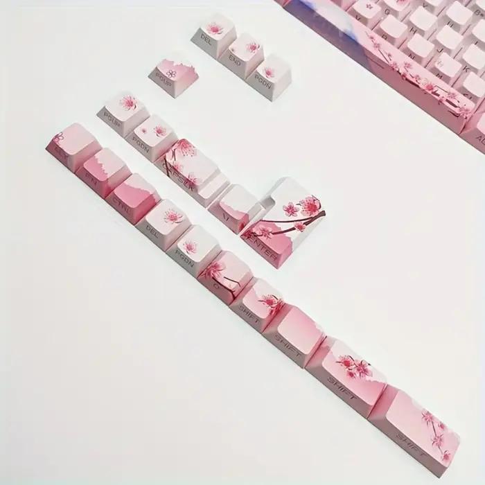Capuchons de touches de clavier mécanique rose fleur de cerisier 128 touches gravure latérale matériau PBT éclairé pour claviers mécaniques normes et ergonomiques