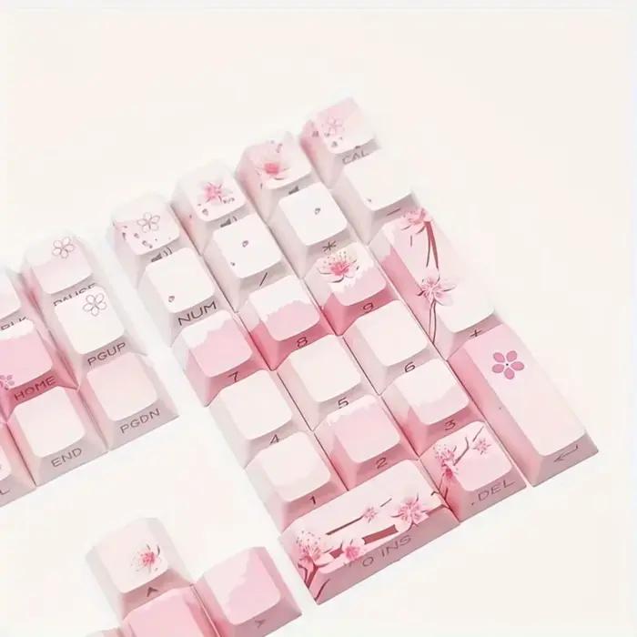 Capuchons de touches de clavier mécanique rose fleur de cerisier 128 touches gravure latérale matériau PBT éclairé pour claviers mécaniques normes et ergonomiques