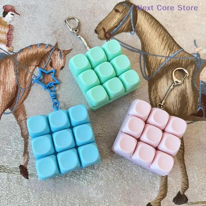 Antistress 9 touches clavier bouton doigt clé capuchon pendentif