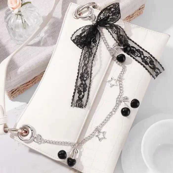 Porte-clés à nœud cerise pour femmes à la mode ; Chaîne de sac polyvalente ; Adorable décoration de pendentif de sac ; Cadeau d'accessoires parfait