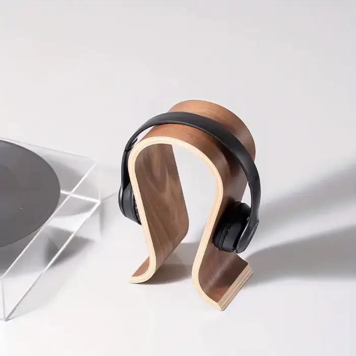 Support pour écouteurs en bois en forme de U