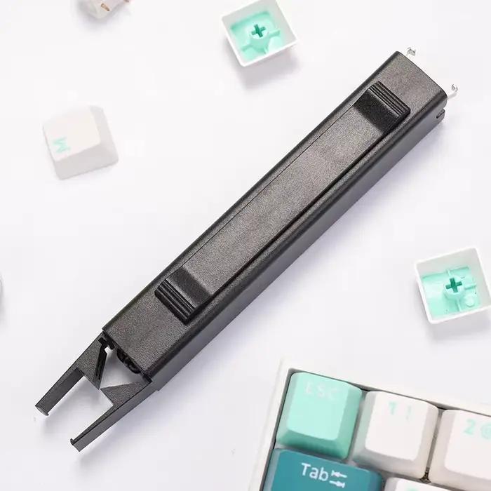Extracteur de capuchons de touches 2 en 1