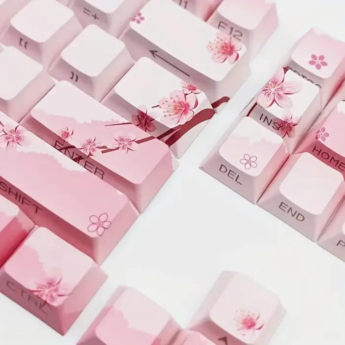 Capuchons de touches de clavier mécanique rose fleur de cerisier 128 touches gravure latérale matériau PBT éclairé pour claviers mécaniques normes et ergonomiques
