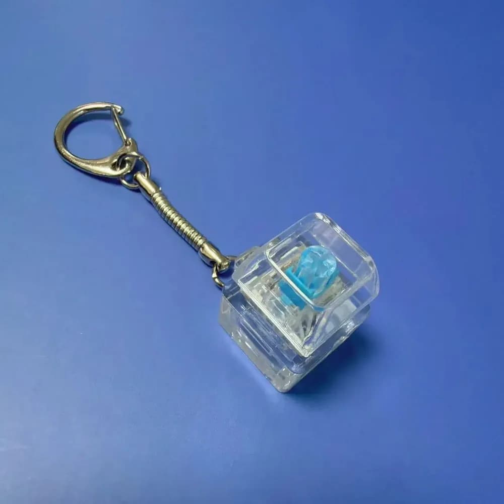 Nouveau porte-clés anti-stress à 3/4/9 touches, clavier miniature, jouet à pincer pour adultes
