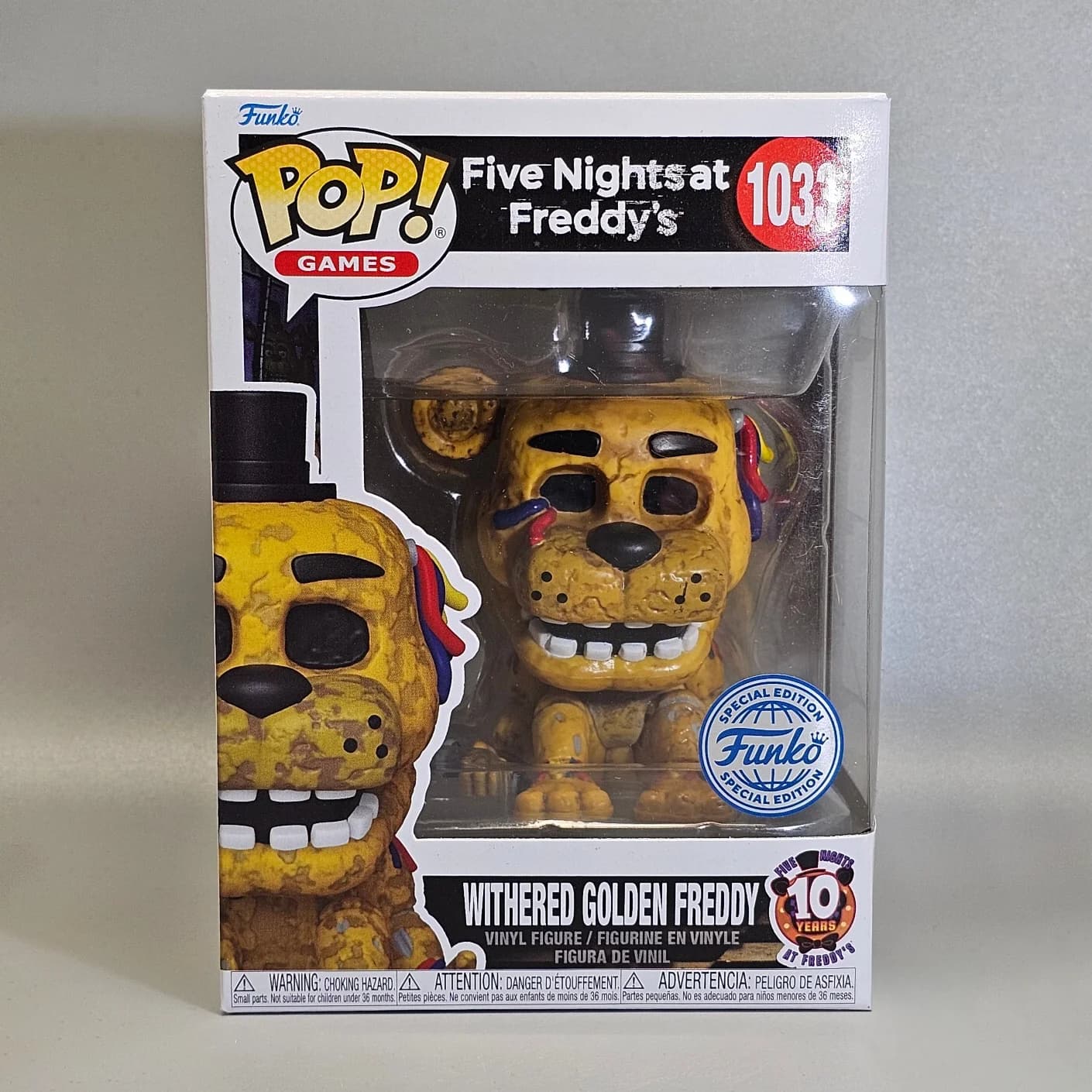Figurine en vinyle Five Nights at Freddy's - Withered Golden Freddy # 1033 Funko Pop Officiel sous l