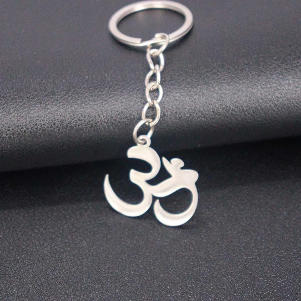 Nouveau porte-clés élégant en acier inoxydable avec pendentif om pour la méditation, simple et polyv