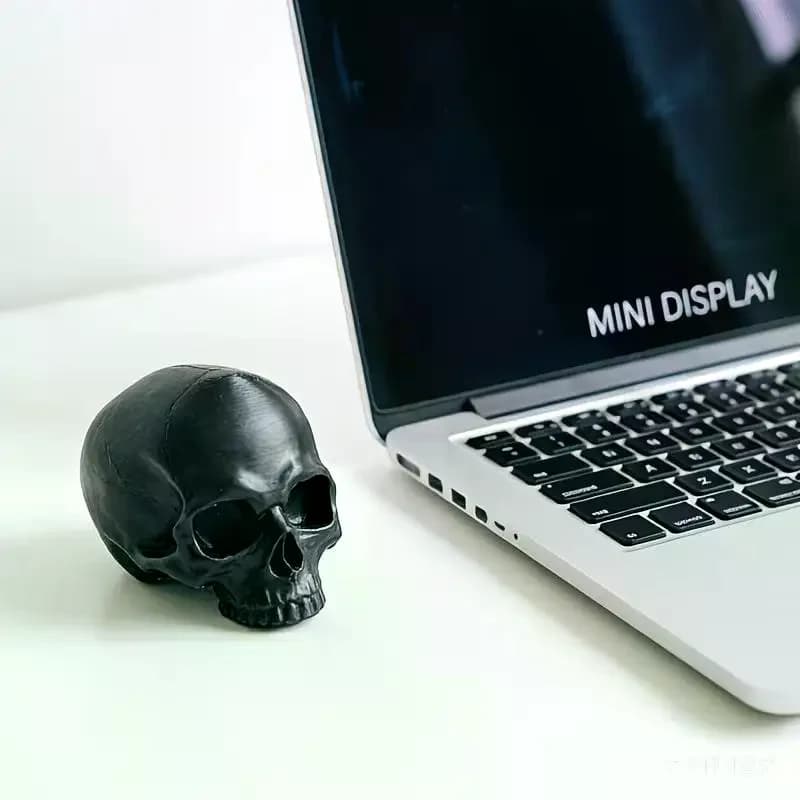Décoration de moniteur en forme de tête de crâne
