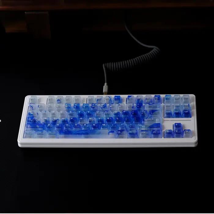 Les touches de clavier en forme de vague 122 sont semi-transparentes, clavier mécanique avec interru