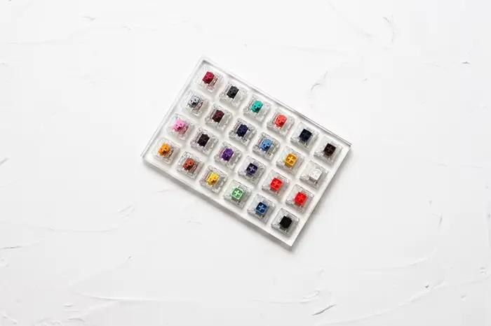 Testeur de 24 interrupteurs Kailh avec base acrylique et touches vierges pour claviers mécaniques pour enfants et adultes, configurables pour ordinateurs portables et de bureau, touches mécaniques interchangeables pour une utilisation ergonomique et confortable
