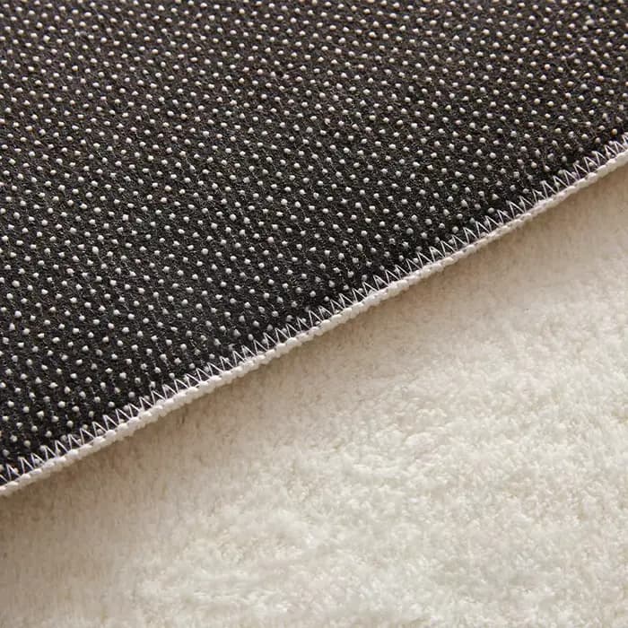 Tapis de forme irrégulière pour salon