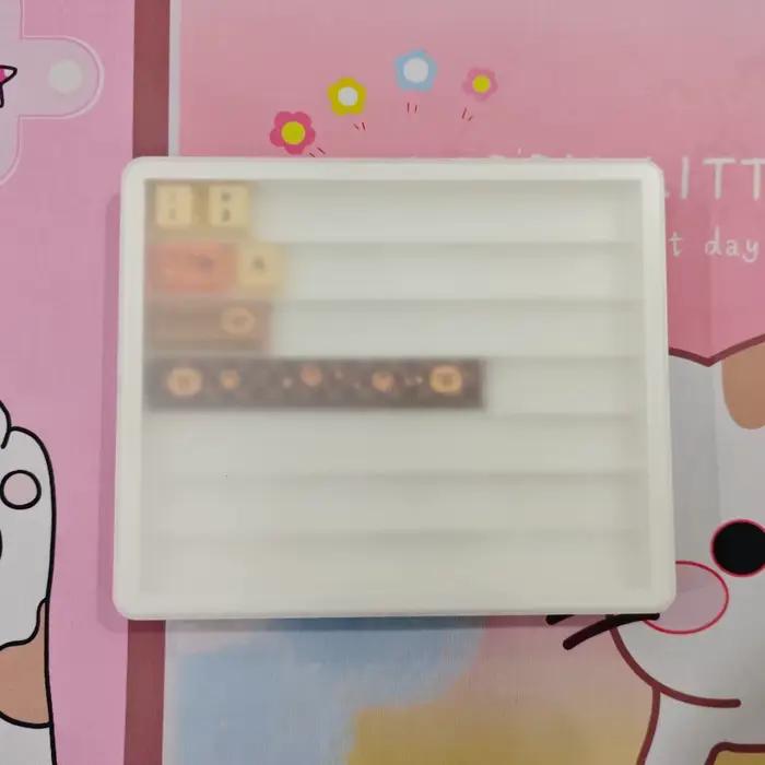 Boîte de rangement pour touches de clavier noir et blanc